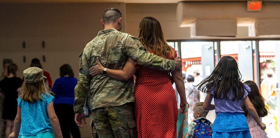 service member returns to family