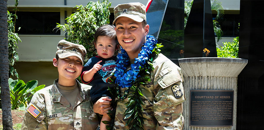 dual service member family smiling