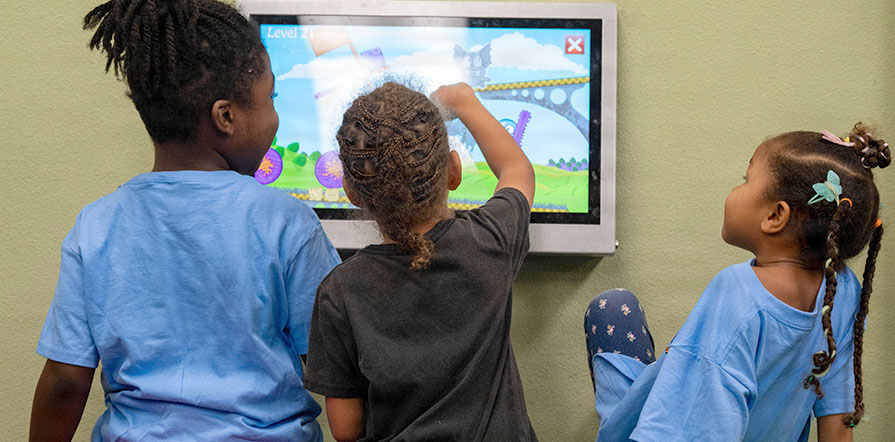 kids enjoy library activity