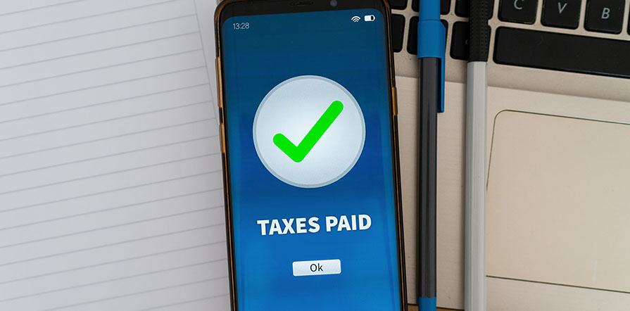 phone with taxes paid on screen