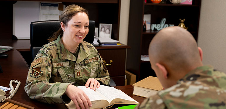 service member discusses legal matters