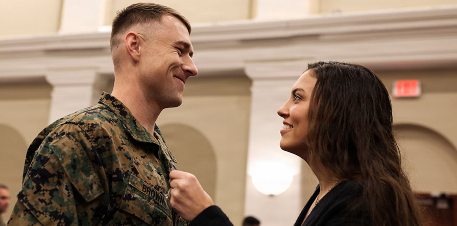 service member is pinned by wife