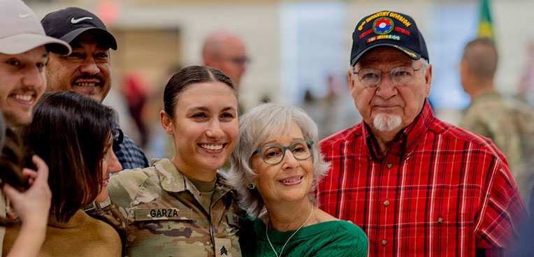 service member with family