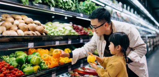 father and daughter grocery shopping