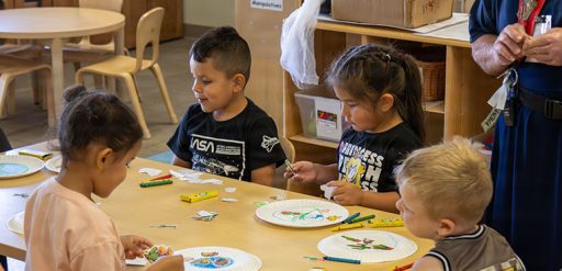 children playing in classroom