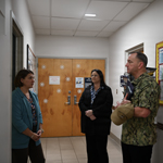 service member having a discussion with colleagues