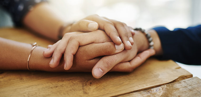 two hands holding