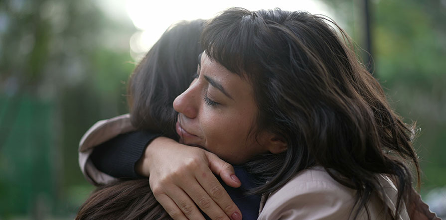two women hugging