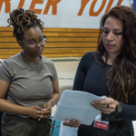 school liaison officer speaking to a service member